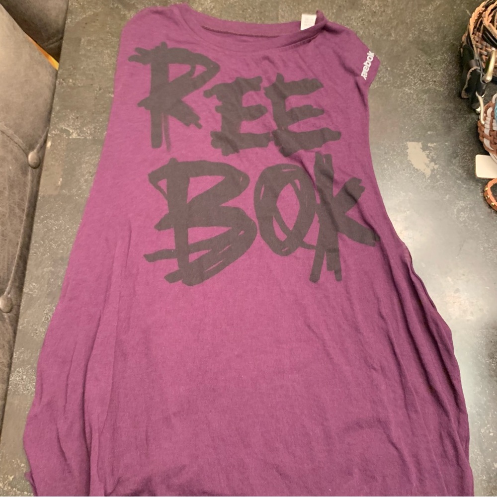 Reebok Women’s purple muscle tank size large